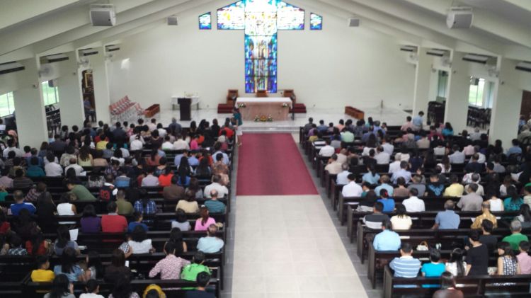 The morning congregation getting ready for the Mass. View seen from newly-built choir loft.