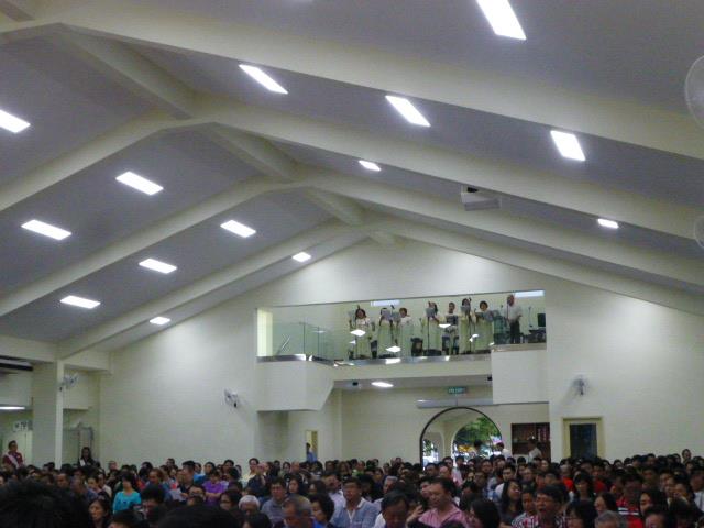 The parishioners (foreground) seen during the celebration. 